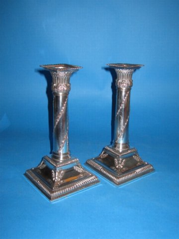 A Pair of Small George III Candlesticks, circa 1785. Possibly by Winter & Co.,  - Click to enlarge and for full details.