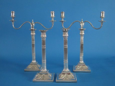 A Suite of George III  Pair of Candelabra & Two Candlesticks, circa 1775. - Click to enlarge and for full details.