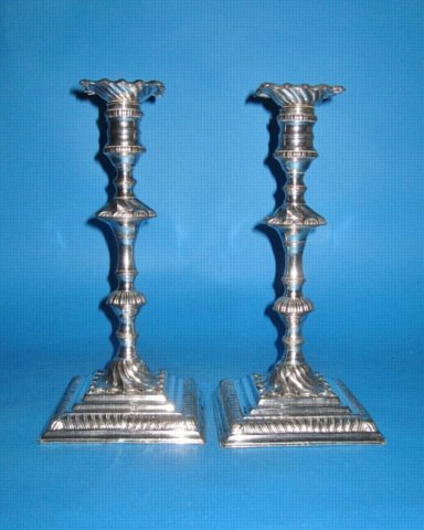 A Pair of George III Candlesticks by Tudor & Co., circa 1760. - Click to enlarge and for full details.