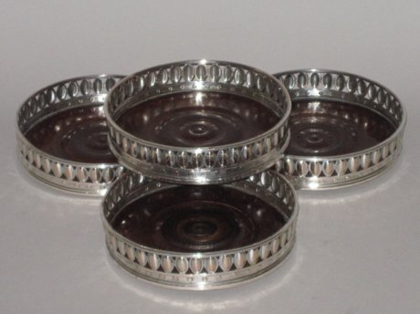 SET OF FOUR 18TH CENTURY OLD SHEFFIELD PLATE SILVER WINE COASTERS, CIRCA 1780. - Click to enlarge and for full details.