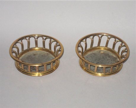 ​A RARE SMALL PAIR OF 18TH CENTURY COPPERGILT  WINE GLASS COASTERS. GEORGE III, CIRCA 1785. - Click to enlarge and for full details.
