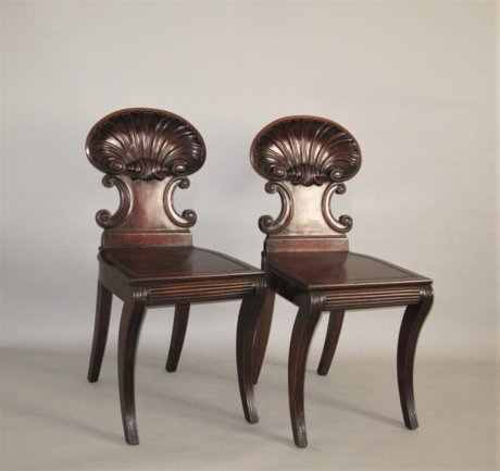 A FINE PAIR OF MAHOGANY HALL CHAIRS, CIRCA 1810. - Click to enlarge and for full details.