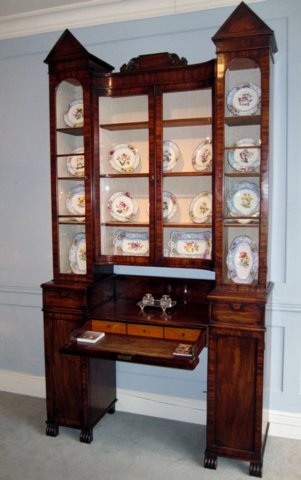A MAHOGANY SECREATIRE BOOKCASE/CHINA CABINET. CIRCA 1830 - Click to enlarge and for full details.